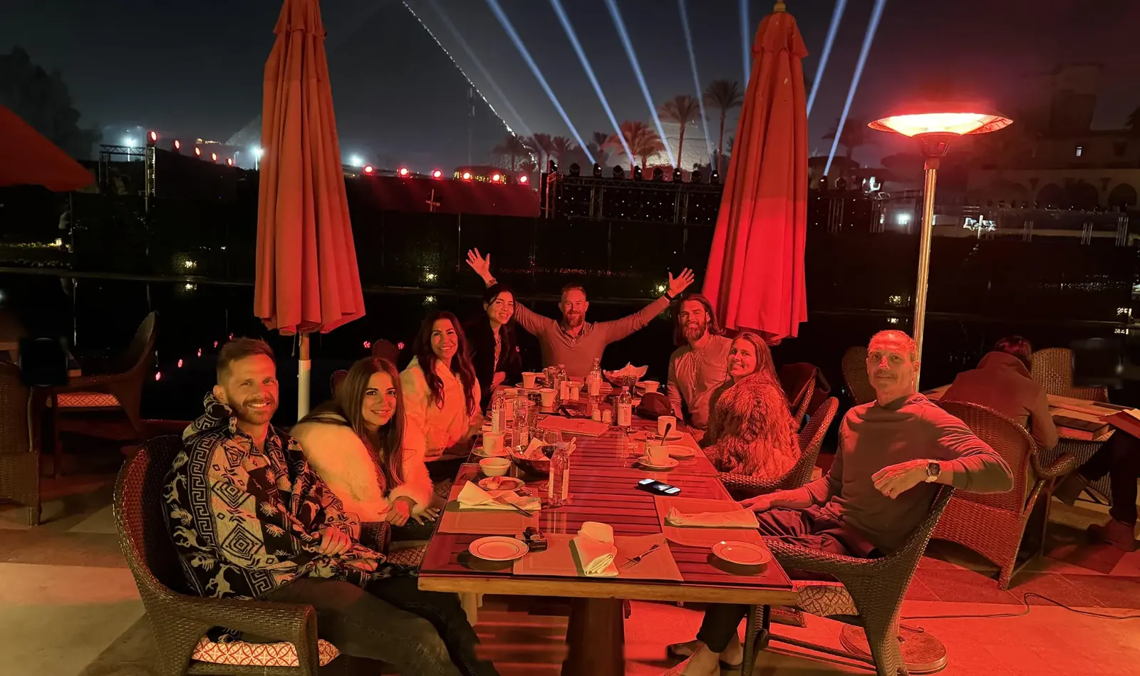 Group dinner at Mena House with the pyramids lit at night