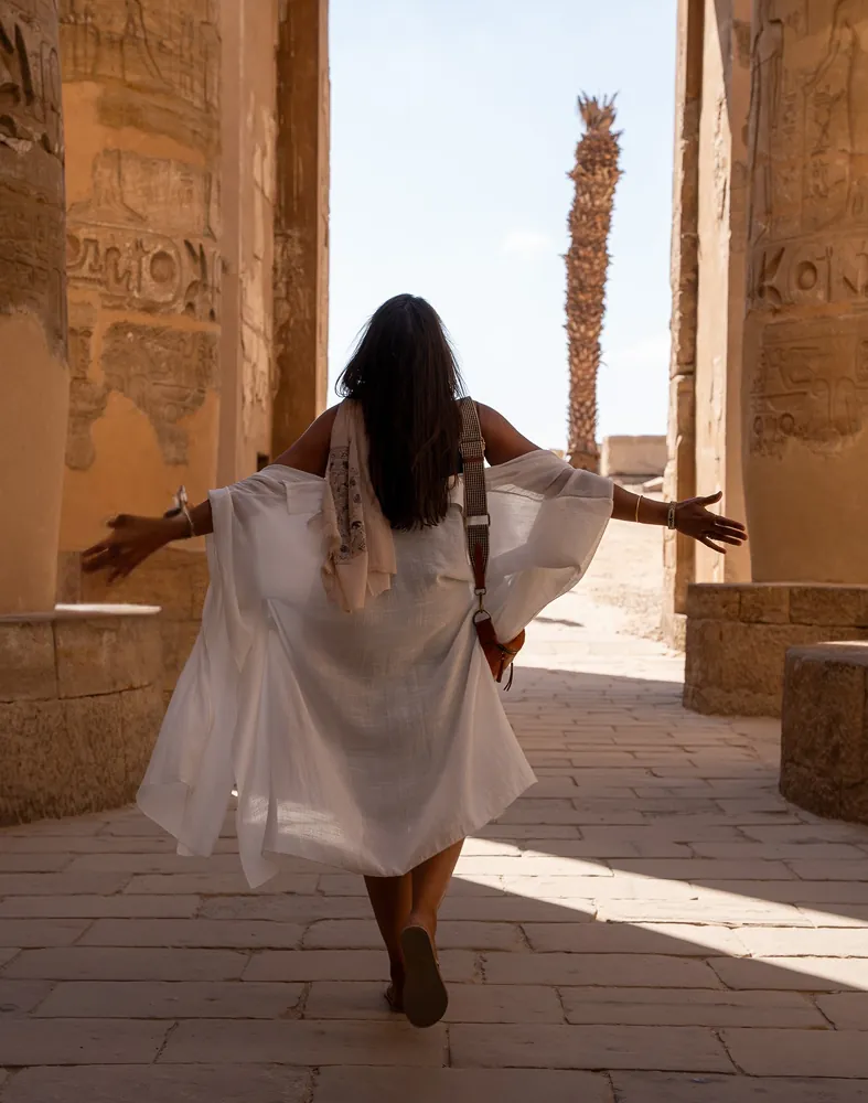 Deborah walking through temple columns