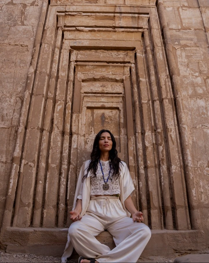 Meditation in a temple gateway